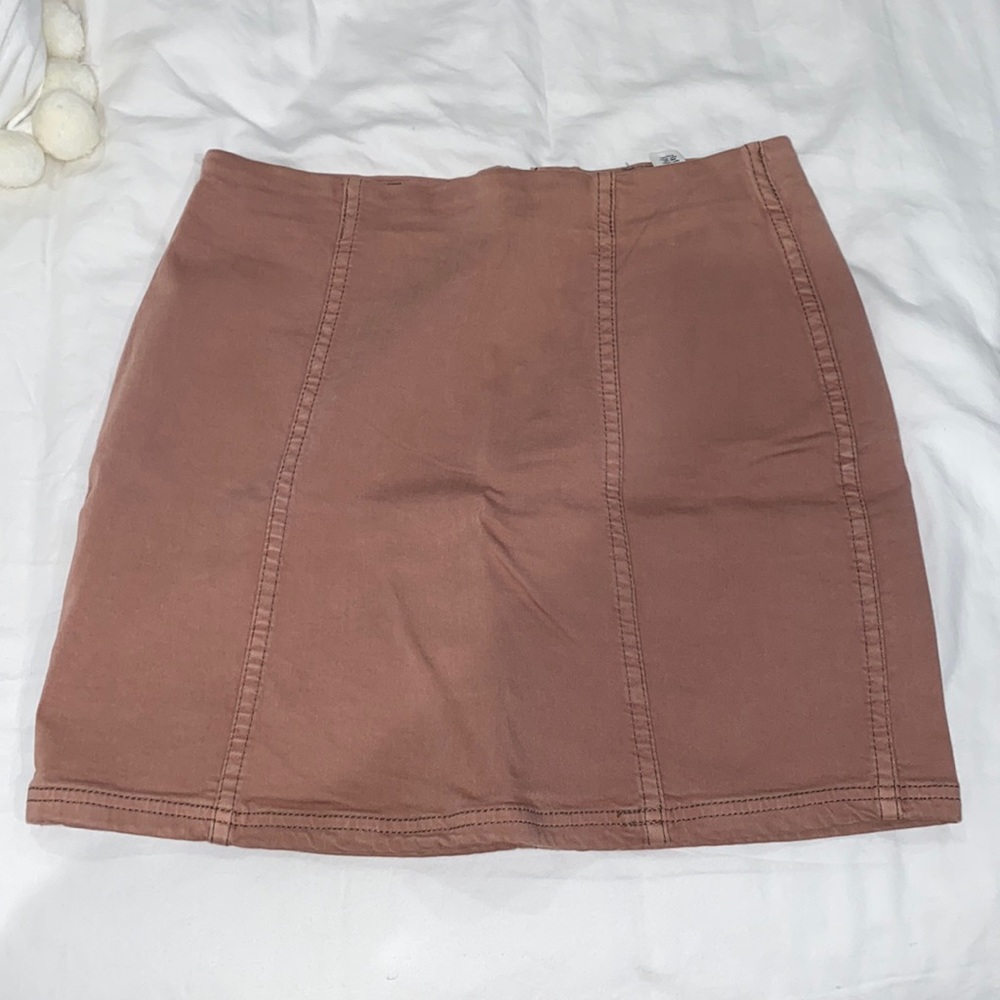 Blush colored mini pencil skirt.